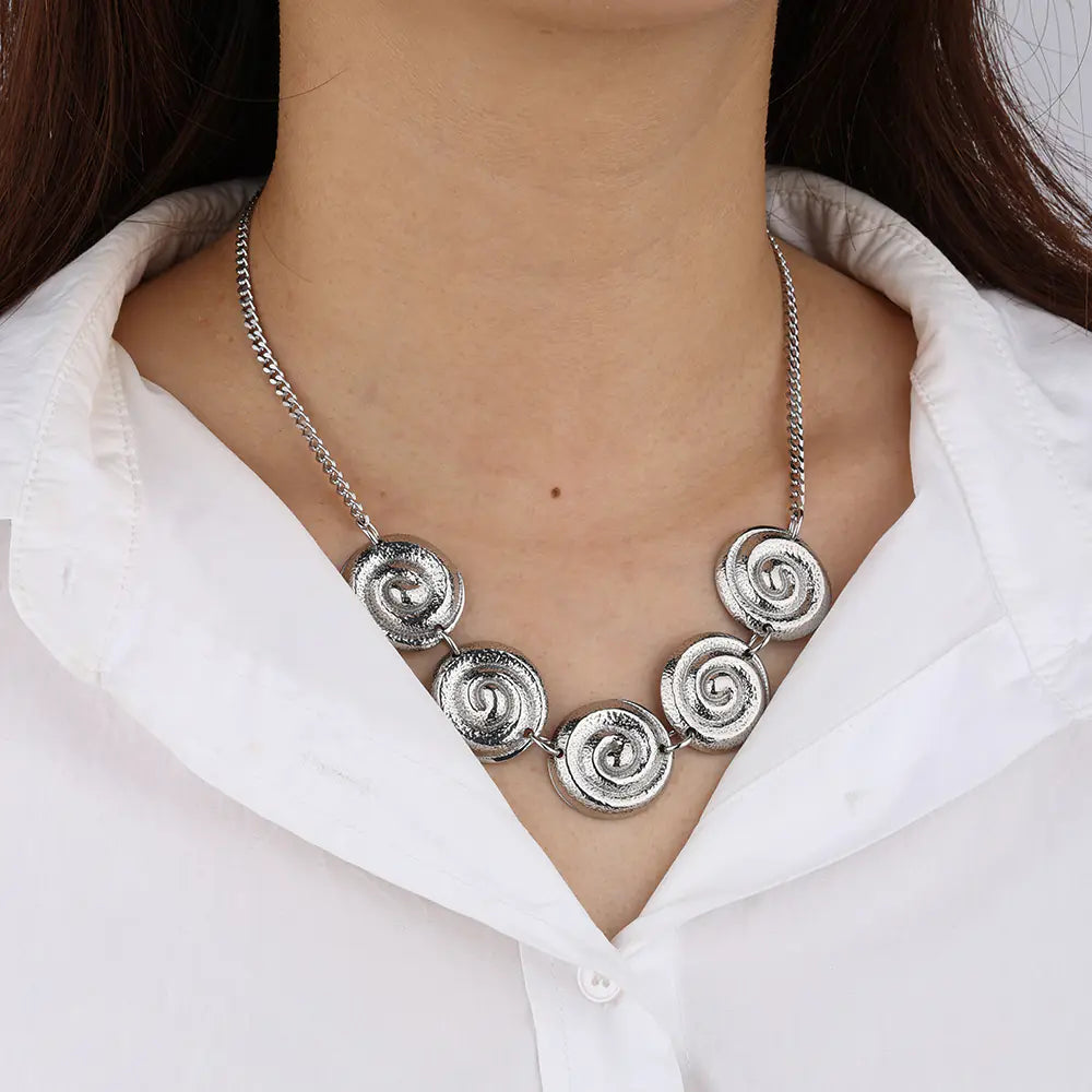 Polished Stainless Steel Round Rotating Pattern Necklace