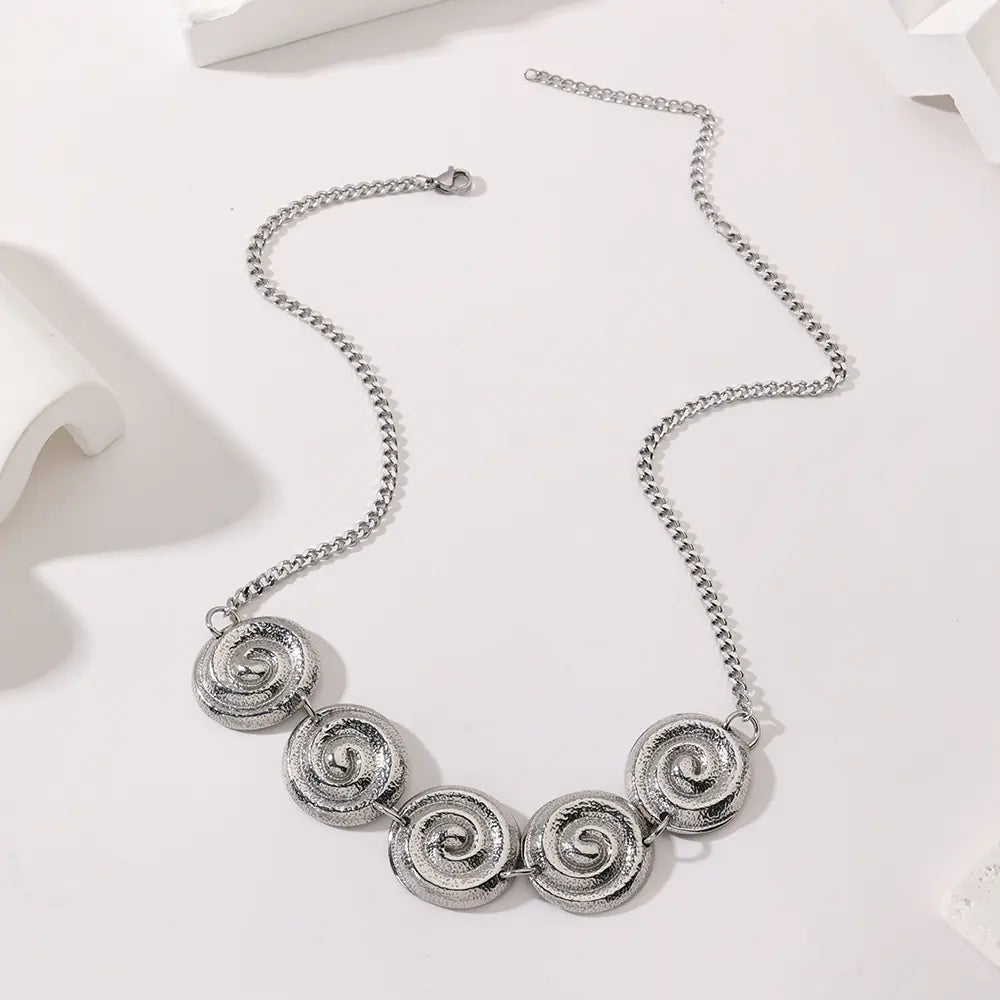 Polished Stainless Steel Round Rotating Pattern Necklace