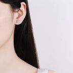 S925 peace knot moissanite earrings